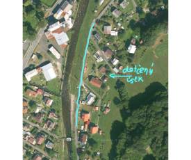 Oprava povrchu vozovky poškozené povodní