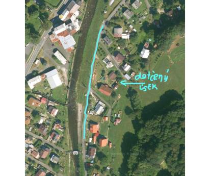 Oprava povrchu vozovky poškozené povodní